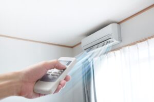 Ductless mini-split being controlled by a remote